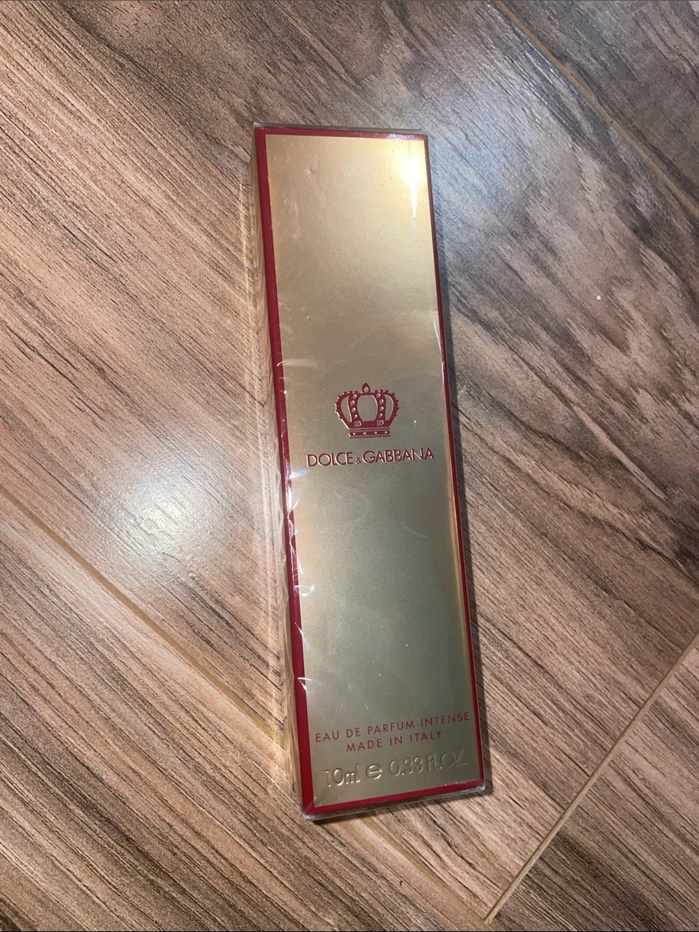Dolce & Gabbana Gold Packaging with Red Accents